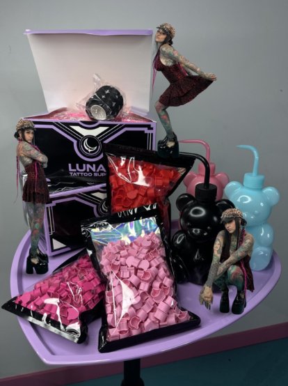 Heart ink caps & rinse cups from Lunar Tattoo Supply, in Tia Berry's tattoo station
