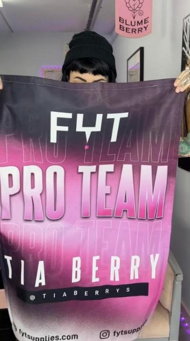 Tia with her FYT Pro Team banner