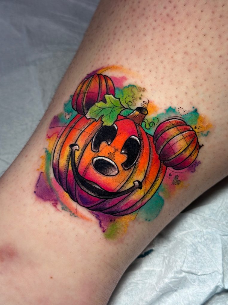 Jack-o-lanterns tattoo on the leg by Tia Berry, colour tattoo artist in Vancouver